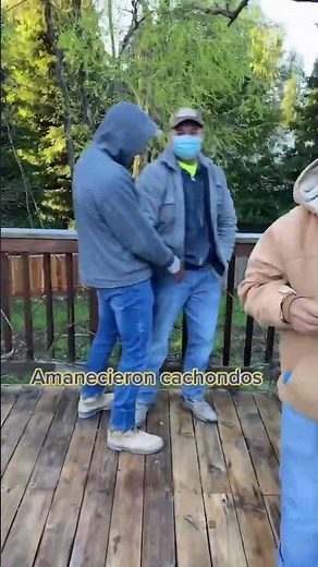 Men Playfully Tease Each Other on Deck#Friendship #Playful #Teasing #DeckFun