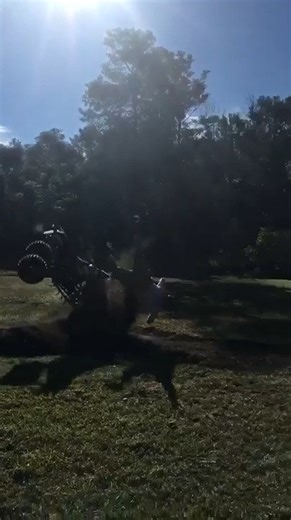 Guy Tires to Jump ATV Across the Yard, Fails Miserably