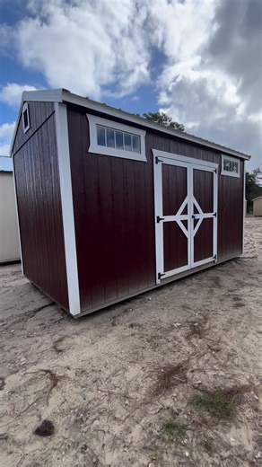 8x16 Side Utility — Small Shed, Big Possibilities! Perfect for lawn gear, tools, or even a cozy backyard workshop. With double doors on the side and solid construction all around, it’s easy to see why this little shed is a customer favorite. Built tough, built to last — ready to be customized with your choice of colors, roof style, and add-ons. | Eternity Buildings