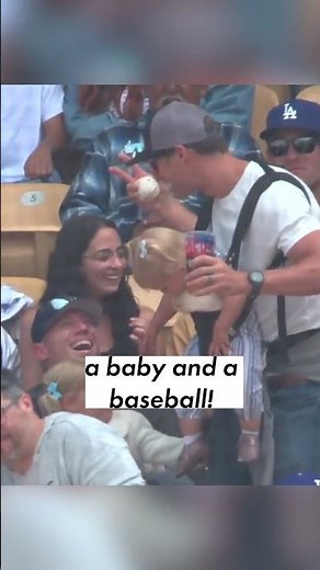 ⚾ Dodger fan snags foul ball while holding a beer and... a baby?! 🍺 | #shorts | New York Post Sports