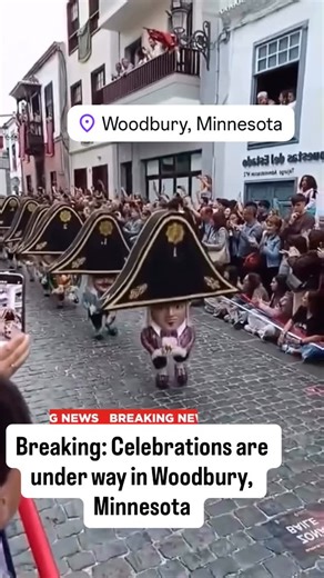 Channel 8 Minnesota on Instagram: "BREAKING NEWS: Crowds line the streets in Woodbury, Minnesota as a costumed parade marches through town, drawing cheers and packed sidewalks during an unexpected afternoon celebration. Authorities say the event remains peaceful as spectators gather to watch the unique oversized head performers make their way down the cobblestone route. More details to follow. #minnesota #meme #channel8minnesota #viral #minneapolis"