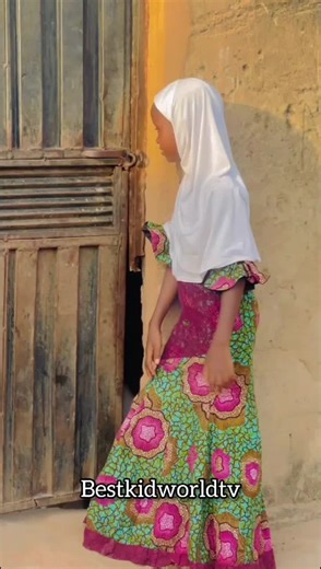 African Kid Singing with Bottle: A Cultural Celebration