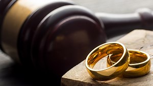 Federal judge gives 2 Navy vets in Chinese sham weddings no new jail time