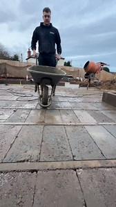 Sealing all the block and beam together with cement slurry Developing Homes | Andrew Hubbard