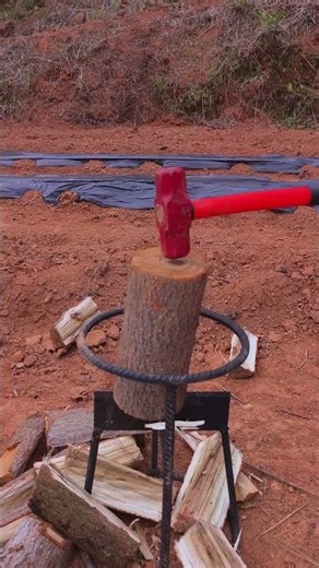 The four-part wood splitting tool is extremely handy! #farmer #tools #lifetips #shorts