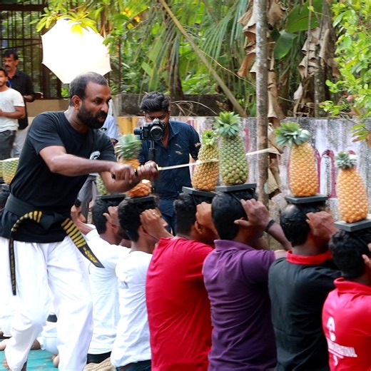 Superb speed slicing by martial arts teacher K.V Saidalavi from Kerala, India 🍍⚔️ | Guinness World Records