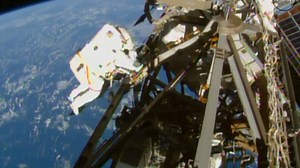 Astronauts venture out for spacewalk