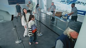 Airport Security Checkpoint Surveillance Camera with AI Biometric Facial Recognition of Passengers