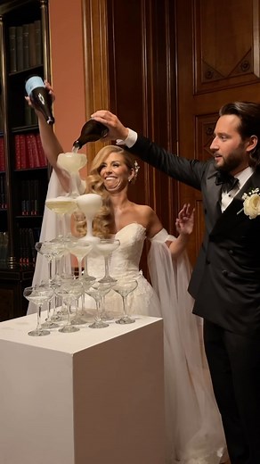 Let’s be honest: We weren’t tall enough for that. #wedding #champagnetower #realbride | Alex Murphy