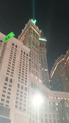 Green lights shining over Abraj Al Bait Clock Tower 💚 a vi touches the soul #Makkah #ClockTow #Viral