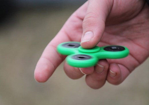 Understanding the Physics of Fidget Spinners