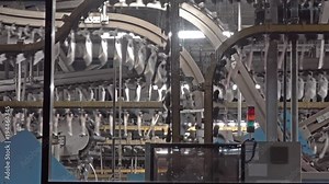 Newspaper production lines seen through a window