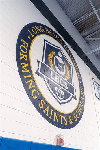 We’re so excited to unveil a special new addition to our school gym! 🎨 Over the past few days, a beautiful mural has come to life on the south wall, and it has completely transformed the space. Huge thanks to the incredibly talented artist Michele Dodd and to our amazing LBC Parents Club for organizing this special project. We’re so grateful! | Long Beach Catholic Regional School - Long Beach