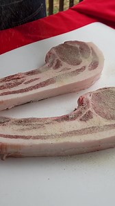 Tomahawk Pork Chops with Pork Belly on the Bone | GrillinFools.com