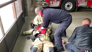This morning, we conducted firefighter survival. In this short video, you will see how we would quickly undress a firefighter who is also wearing his air pack and mask and requires CPR. The firefighter’s shirt would then be removed with trauma shears. Often firefighters drill in Rapid Intervention Teams/Crews (RIT), however the drills tend to end once the downed firefighter has been removed from the structure. In reality, it is not until life saving efforts on the firefighter have been exhausted