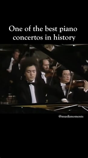 musikmoments on Instagram: "Evgeny Kissin performs Tchaikovsky’s Piano Concerto No. 1 with extraordinary power and tenderness, under the legendary baton of Herbert von Karajan. A performance where fire meets elegance — and the piano becomes a voice you can almost feel. Moments like this are why classical music never stops moving us. #Kissin #EvgenyKissin #Tchaikovsky #PianoConcertoNo1 #Karajan #ClassicalMusic #Piano"
