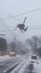 News Helicopter Makes Emergency Landing During Blizzard 🚁 Boulder, Colorado — Wednesday, Winter 2025 Smartphone footage shows a news helicopter attempting an emergency landing on a wide residential street during heavy snowfall. The rotors clip a power line, sending sparks into the snow as the helicopter spins and lands hard before sliding into a fire hydrant. Emergency crews responded immediately, and officials confirmed no one was injured. Authorities said whiteout conditions and icing led to 