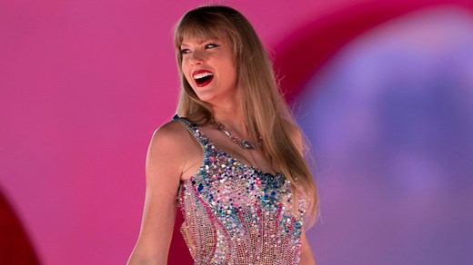 Taylor Swift and Travis Kelce embrace