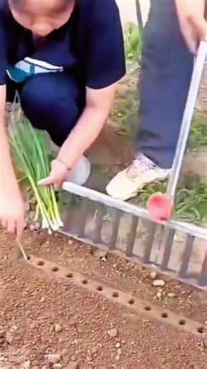 Metal bar aligned on rocky ground, tool steadies measure against earth’s rough plane
