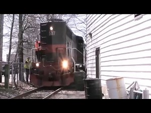 Train passes inches from building! - Trains at Peabody Square, MA