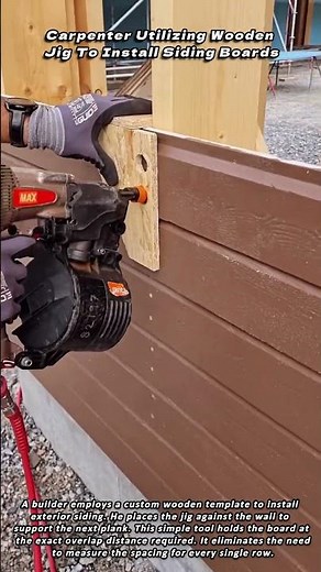 Carpenter Utilizing Wooden Jig To Install Siding Boards