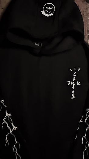 JEMX on Instagram: "Dark, loud, no rules. The Travis Scott black hoodie brings that La Flame energy — gritty, oversized, and made for the night. If it’s too much… you’re not the target."