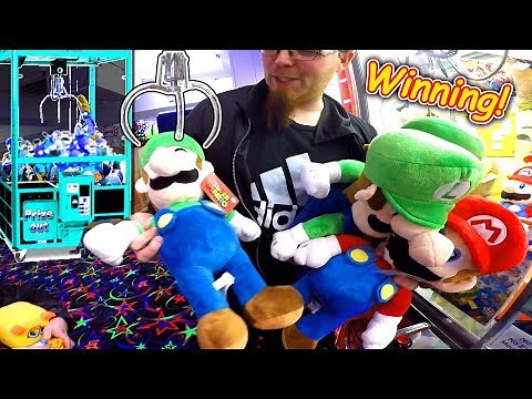 Winning Lot's of Super Mario Bros Stuffed Toys From the Claw Machine at the Arcade and Lot's more!