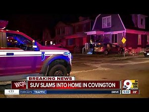 Driver crashes into Covington home