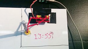 Continue to write time on the whiteboard with a marker "Whiteboard Clock"