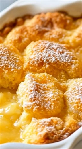 🍪 Magic Lemon Cobbler Delight | The Gooey "Self-Saucing" Secret Imagine a warm, buttery sponge that floats on a hidden lake of velvety lemon custard. This magic lemon cobbler delight is a nostalgic family favorite that literally creates its own silky citrus sauce as it bakes, filling your home with the most incredible aroma of sweet sunshine. 🍋 Yield: 8 large indulgent servings Ingredients: 1/2 cup unsalted butter, melted 1 cup all-purpose flour 1 cup granulated sugar 2 teaspoons baking powder