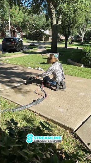Leveling a concrete driveway 💪 #foamconcrete #concreteleveling #drivewayrepair