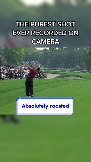 Tiger Woods roasting his approach shot into the 13th green at the 2002...