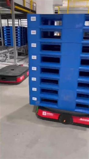 Warehouse material handling AGV transport robots in operation#agvrobot