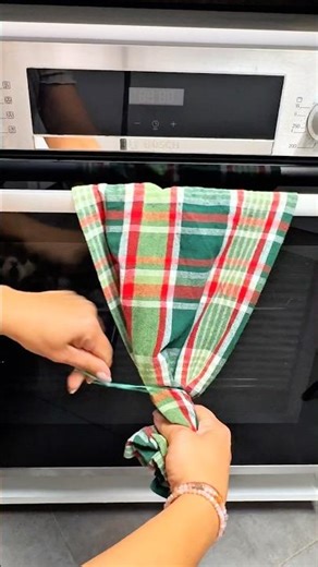A simple way to hang your kitchen towel.It in place and won’t slide off. #KitchenHack #LifeHacks