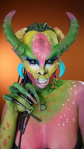 The main color of the zodiac Taurus is Green, second is pink. And otuers are blues and earth colors. Poppin it with vibrant orange for the contrast and you know what? I forgot to put orange on the glue droplets on the forehead🙈🤷🏾‍♀️! Our 6th sign on the series! Halfway there! Compilation soon! #zodiacsigns #series #makeup #taurus | Kristin Ker Anderson