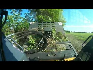 John Deere 325G with CID extreme brush cutter