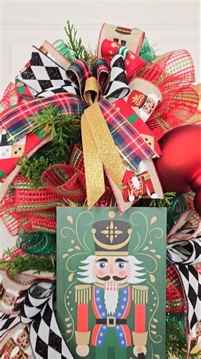 Nutcracker lovers, this one’s for you! This festive swag is full, bright, and bursting with Christmas magic. The perfect statement piece for your holiday decor! 🎁✨️🎄 #doordecor #homedecor #holidayseason #doorswag #nutcracker #holidayvibes❤️ #fypage | Ruby's Crafting Corner
