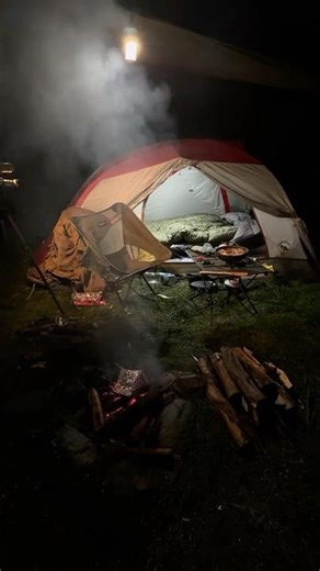 Camping in the rain with tent and tarp