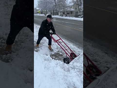 Clearing Snow From End Of Driveway Using Your ClearPlow® Snow Pusher