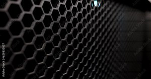Gray metal mesh on black background. Dark square grid pattern and texture