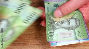 Chile, Counting money, Various pesos banknotes, Financial concept, Home budget, Businesss