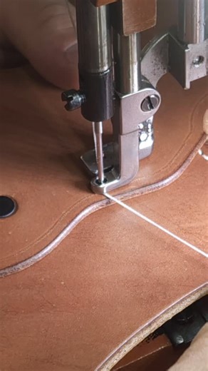 Just In Case Holsters on Instagram: "The footage is sped up, but the work is steady and precise. Stitching a chest holster on my Leather Machine Company Cobra sewing machine — quality leather, clean lines, and attention to every stitch. This is the kind of process that turns raw materials into something built to be worn and relied on. #justincaseholsters #chestholster #leathergoods #leatherholster"