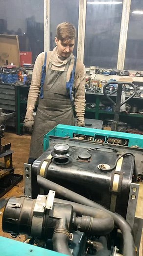 Mechanical Work on Industrial Generator in Workshop