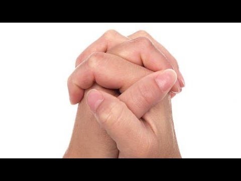 interlock fingers holding hands | Practice meditation everyday | Interlock the fingers
