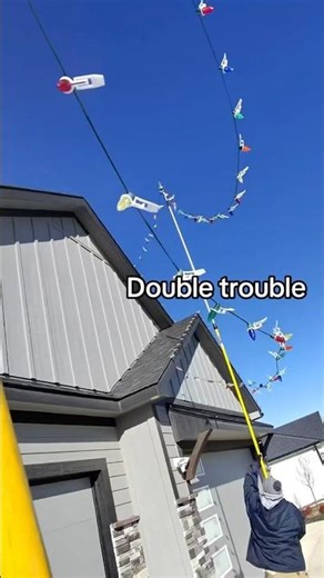 Taking down Christmas lights using painters pole #lighting #bluecollar #christmaslights #ledlights