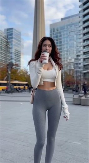 Salt and pepper grey leggings, on the square below the CN Tower low