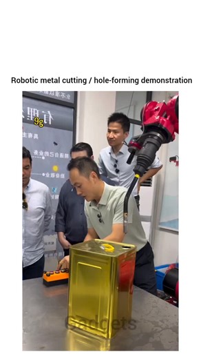 Industrial Gadgets on Instagram: "What you’re looking at is a robotic metal cutting / hole-forming demonstration, most likely showing the use of an industrial robotic arm equipped with a drilling or milling spindle to process a thin metal container (looks like an oil or chemical can). Here’s what’s happening, step by step: 🔺️What the process is: This is robot-assisted machining, where a collaborative or industrial robot performs a precision cutting operation that would traditionally require a d