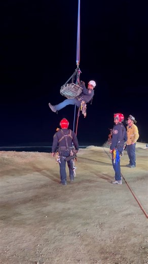 While most were settling in for the evening to prepare for the week ahead, Lifeguards and Fire crews were hard at work rescuing a man and his dog who were stuck on the sand and rocks below Sunset Cliffs Boulevard last night. Shortly after 7:30 p.m., crews arrived to find the man and his four-legged sidekick uninjured, yet unable to climb to safety. Given the weather conditions, crews quickly came up with a plan to get them out, using a rope system and a ladder truck to safely hoist both to solid