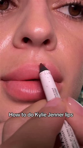 @makeup_by_uli on Instagram: "How to do Kylie Jenner Lips👄 Kylie Jenner–style lips aren’t about copying someone else’s overline, they’re about understanding your own lip proportions. The shape of the cupid’s bow, lip corners, and symmetry is what creates that full, sculpted look without going too far. With @skyfluence_beauty , I analyzed my lip shape and learned exactly where to define, where to stay natural, and how to build volume that looks balanced and modern. When your technique follows yo