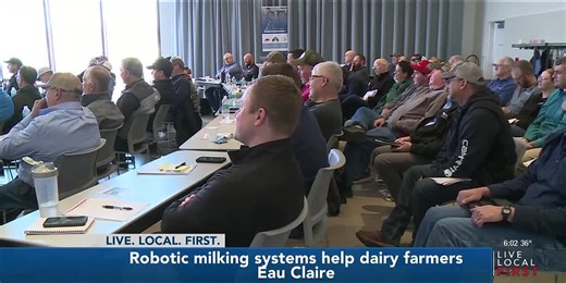 Farmers meet with researchers to discuss robotic milking